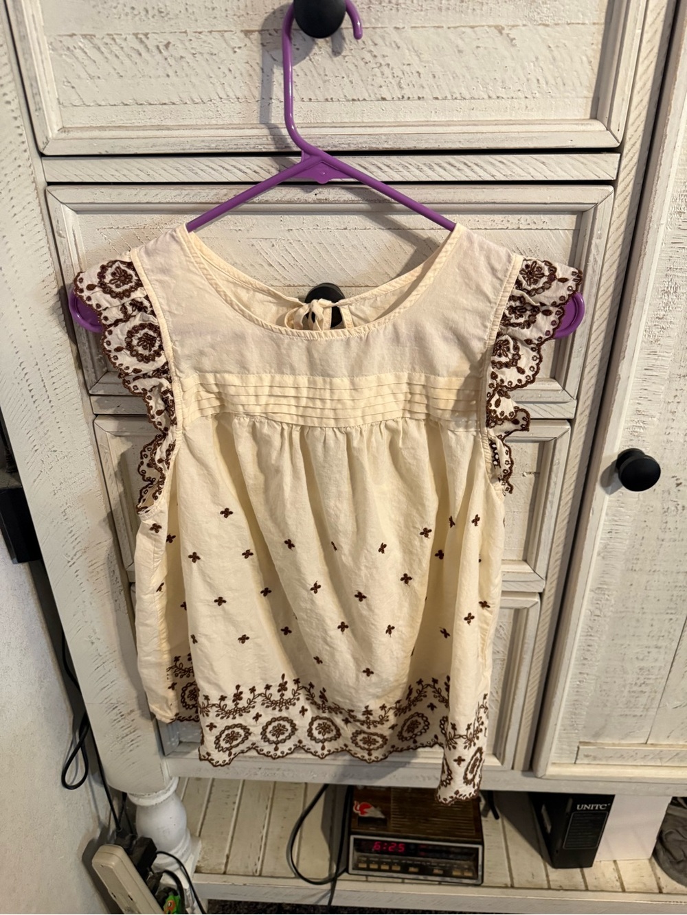 Cream Embroidered Sleeveless Blouse with Brown Trim